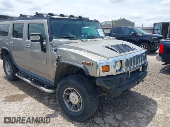 2003 Hummer H2 with VIN 5GRGN23U23H148326, listed as a IAAI auction lot 42068326 with 149,396 mi miles. Bid and sale history available at carsss.com. Image 1.