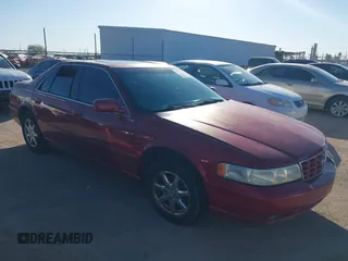 2000 Cadillac Seville Touring STS z VIN 1G6KY5496YU234108, wystawiony jako IAAI lot #41484829 z przebiegiem Nie podano mil oraz . Historia ofert i sprzedaży dostępna na DreamBid. Obrazek 1.