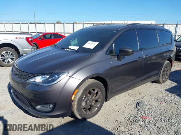 2020 Chrysler Pacifica Touring with VIN 2C4RC1FG1LR245764, listed as a IAAI auction lot 40646472 with 86,119 mi miles and . Bid and sale history available at DreamBid. Image 17.