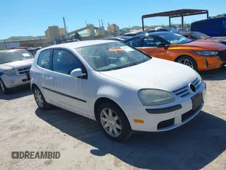 2009 Volkswagen Rabbit S with VIN WVWAB71K59W106364, listed as a IAAI auction lot 41862718 with 125,538 mi miles. Bid and sale history available at carsss.com. Image 1.