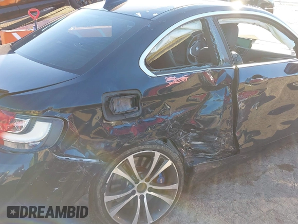 2015 BMW 2 Series 228i with VIN WBA1F5C53FV257153, listed as a IAAI auction lot 41294335 with 99,919 mi miles. Bid and sale history available at carsss.com. Image 6.