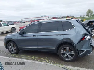 2019 Volkswagen Tiguan SEL Premium with VIN 3VV4B7AX9KM095580, listed as a IAAI auction lot 41915639 with 67,440 mi miles and . Bid and sale history available at DreamBid. Image 14.