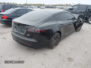 2022 Tesla Model S Plaid with VIN 5YJSA1E65NF484149, listed as a IAAI auction lot 40937538 with 11,459 mi miles and . Bid and sale history available at DreamBid. Image 4.