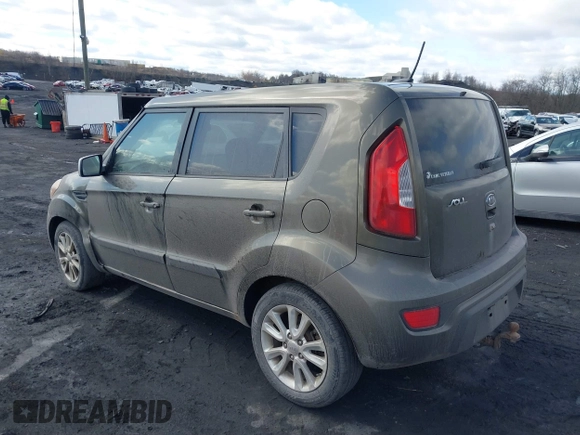 2012 Kia Soul + with VIN KNDJT2A60C7392564, listed as a IAAI auction lot 41702795 with 147,282 mi miles. Bid and sale history available at carsss.com. Image 3.