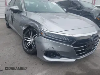 2021 Honda Accord Touring with VIN 1HGCV3F99MA020450, listed as a IAAI auction lot 42194371 with 19,206 mi miles and . Bid and sale history available at DreamBid. Image 6.