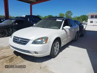 2002 Nissan Altima SE with VIN 1N4BL11D92C218274, listed as a IAAI auction lot 41788444 with 196,432 mi miles. Bid and sale history available at carsss.com. Image 2.