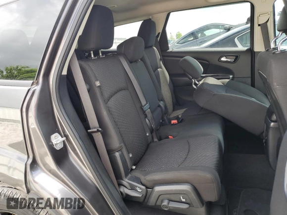 2017 Dodge Journey SXT z VIN 3C4PDDBG3HT703935, wystawiony jako Copart lot #57620915 z przebiegiem 126 915 mil mil oraz Szkoda całkowita • Salvage title. Historia ofert i sprzedaży dostępna na DreamBid. Obrazek 11.