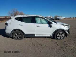 2013 Hyundai Santa Fe Sport z VIN 5XYZT3LB2DG021803, wystawiony jako IAAI lot #41195838 z przebiegiem Nie podano mil oraz . Historia ofert i sprzedaży dostępna na DreamBid. Obrazek 13.