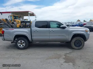 2019 Toyota Tacoma 4WD SR with VIN 3TMCZ5AN4KM194526, listed as a IAAI auction lot 42021504 with 87,767 mi miles. Bid and sale history available at carsss.com. Image 13.