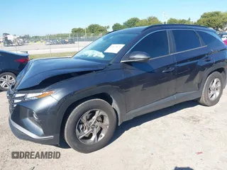2022 Hyundai Tucson SEL with VIN 5NMJB3AE7NH065963, listed as a IAAI auction lot 41673572 with 55,404 mi miles. Bid and sale history available at carsss.com. Image 2.