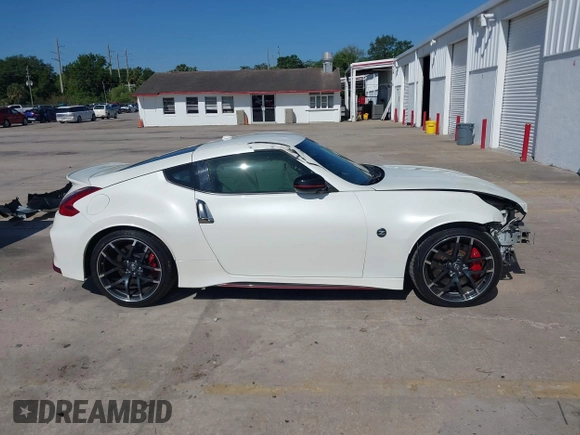 2019 Nissan 370Z Sport Touring with VIN JN1AZ4EH1KM420123, listed as a IAAI auction lot 41995950 with 82,678 mi miles and . Bid and sale history available at DreamBid. Image 14.