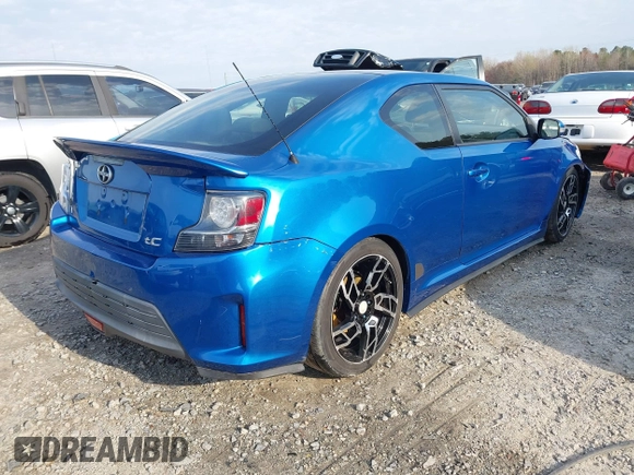 2014 Scion tC with VIN JTKJF5C72E3086001, listed as a IAAI auction lot 41721986 with 207,239 mi miles. Bid and sale history available at carsss.com. Image 4.