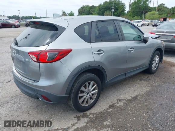 2013 Mazda CX-5 Touring with VIN JM3KE2CE3D0136911, listed as a IAAI auction lot 42095413 with 158,515 mi miles. Bid and sale history available at carsss.com. Image 4.