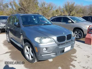 2007 BMW X5 3.0si with VIN 5UXFE43577L014625, listed as a IAAI auction lot 41325492 with 200,769 mi miles. Bid and sale history available at carsss.com. Image 1.