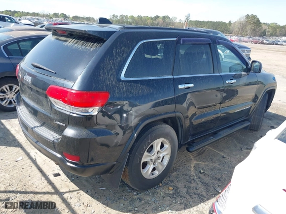 2014 Jeep Grand Cherokee Laredo with VIN 1C4RJEAG1EC263584, listed as a IAAI auction lot 41936615 with 391,334 mi miles. Bid and sale history available at carsss.com. Image 4.