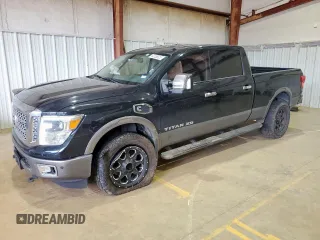 2016 Nissan Titan Pro-4X with VIN 1N6BA1F44GN509606, listed as a Copart auction lot 62336625 with 258,040 mi miles and Salvage title. Bid and sale history available at DreamBid. Image 1.