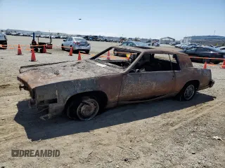 1979 Cadillac Eldorado z VIN 6L57B9E638130, wystawiony jako Copart lot #56873134 z przebiegiem Nie podano mil oraz Nie do naprawy • Non repairable. Historia ofert i sprzedaży dostępna na DreamBid. Obrazek 2.
