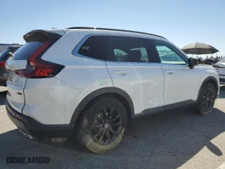 2023 Honda CR-V Hybrid Sport with VIN 2HKRS5H52PH705264, listed as a Copart auction lot 50102705 with 33,558 mi miles and Salvage Title. Bid and sale history available at carsss.com. Image 3.