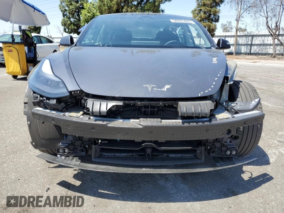 2023 Tesla Model 3 with VIN 5YJ3E1EA4PF615975, listed as a Copart auction lot 58845405 with 38,927 mi miles and Salvage title. Bid and sale history available at DreamBid. Image 5.