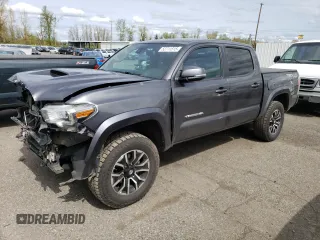 2020 Toyota Tacoma SR5 with VIN 3TMCZ5AN7LM325529, listed as a Copart auction lot 52711515 with 84,681 mi miles and Salvage title. Bid and sale history available at DreamBid. Image 1.