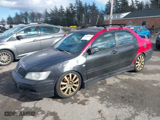 2003 Mitsubishi Lancer OZ-Rally with VIN JA3AJ86E03U078826, listed as a IAAI auction lot 41700333 with 119,656 mi miles. Bid and sale history available at carsss.com. Image 2.