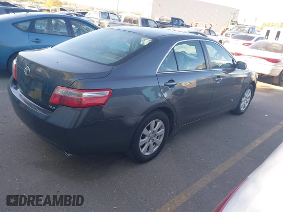 2007 Toyota Camry LE with VIN 4T1BK46K27U044809, listed as a IAAI auction lot 42151495 with 247,984 mi miles and . Bid and sale history available at DreamBid. Image 4.