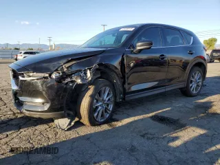 2020 Mazda CX-5 Grand Touring with VIN JM3KFADM0L0786565, listed as a Copart auction lot 48430915 with 60,390 mi miles and Salvage Title. Bid and sale history available at carsss.com. Image 1.