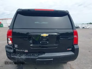 2017 Chevrolet Tahoe LT z VIN 1GNSKBKC8HR311969, wystawiony jako IAAI lot #42126414 z przebiegiem 160 994 mil mil oraz . Historia ofert i sprzedaży dostępna na DreamBid. Obrazek 16.