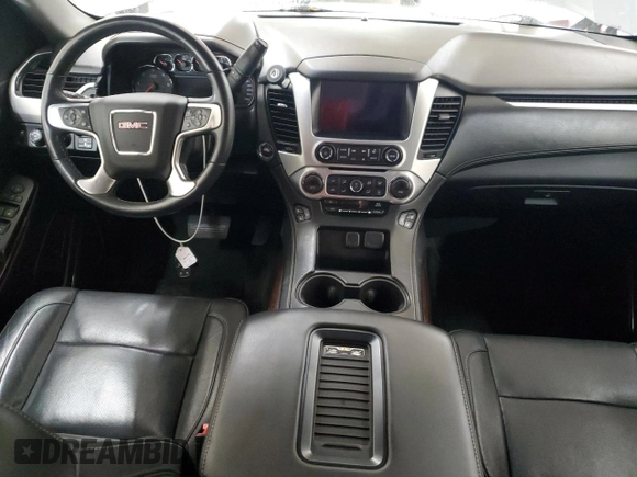 2015 GMC Yukon SLT z VIN 1GKS2BKC0FR630731, wystawiony jako Copart lot #55359445 z przebiegiem Nie podano mil oraz Szkoda całkowita • Salvage title. Historia ofert i sprzedaży dostępna na DreamBid. Obrazek 8.