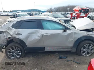 2023 Mazda CX-30 S Premium with VIN 3MVDMBDMXPM563500, listed as a IAAI auction lot 42092423 with 9,148 mi miles and . Bid and sale history available at DreamBid. Image 14.