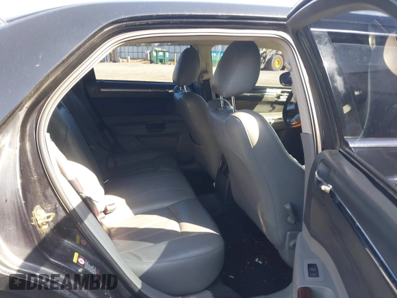 2005 Chrysler 300 with VIN 2C3AA63H65H145122, listed as a IAAI auction lot 41847043 with 237,757 mi miles. Bid and sale history available at carsss.com. Image 8.