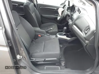 2018 Honda Fit EX with VIN 3HGGK5H85JM704873, listed as a IAAI auction lot 42421049 with 58,481 mi miles and . Bid and sale history available at DreamBid. Image 5.