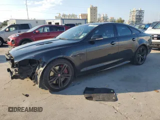 2014 Jaguar XJ R with VIN SAJWA1EK6EMV58766, listed as a Copart auction lot 72199894 with 123,444 mi miles and Salvage title. Bid and sale history available at DreamBid. Image 1.