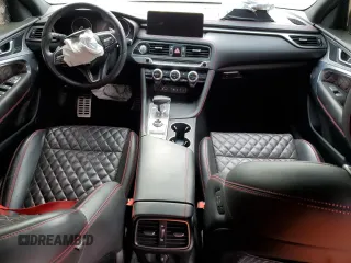 2022 Genesis G70 3.3T z VIN KMTG54TE1NU094180, wystawiony jako Copart lot #49625225 z przebiegiem 35 088 mil mil oraz Szkody całkowita. Historia ofert i sprzedaży dostępna na DreamBid. Obrazek 8.