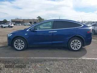 2016 Tesla Model X 70D z VIN 5YJXCAE29GF015890, wystawiony jako IAAI lot #41637564 z przebiegiem 145 848 mil mil oraz . Historia ofert i sprzedaży dostępna na DreamBid. Obrazek 14.