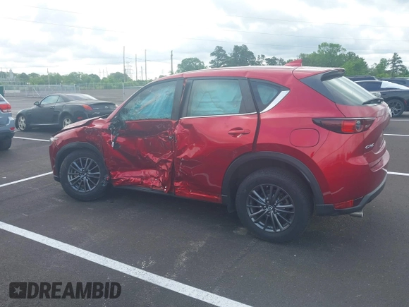 2019 Mazda CX-5 Sport with VIN JM3KFABM5K0627087, listed as a IAAI auction lot 42163866 with 38,050 mi miles and . Bid and sale history available at DreamBid. Image 14.