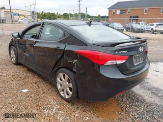 2013 Hyundai Elantra GLS PZEV with VIN KMHDH4AE7DU728890, listed as a IAAI auction lot 40365489 with 230,693 mi miles. Bid and sale history available at carsss.com. Image 3.