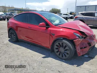 2022 Tesla Model Y Performance z VIN 7SAYGDEF9NF510183, wystawiony jako Copart lot #61263405 z przebiegiem 19 411 mil mil oraz Szkoda całkowita • Salvage title. Historia ofert i sprzedaży dostępna na DreamBid. Obrazek 4.