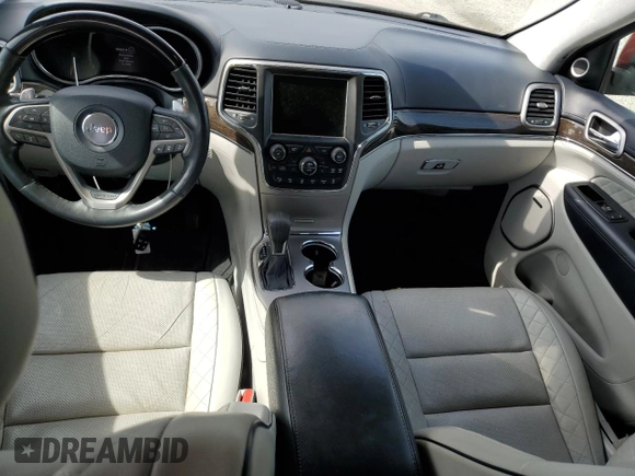 2017 Jeep Grand Cherokee Summit with VIN 1C4RJFJT8HC723895, listed as a Copart auction lot 53960565 with 115,252 mi miles and Salvage title. Bid and sale history available at DreamBid. Image 8.