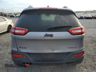 2014 Jeep Cherokee Trailhawk with VIN 1C4PJMBB3EW158869, listed as a Copart auction lot 42860515 with 135,172 mi miles and Non repairable. Bid and sale history available at DreamBid. Image 6.