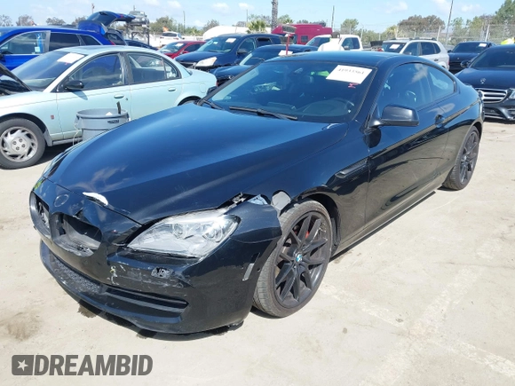 2013 BMW 6 Series 650i with VIN WBAYM9C57DDW20178, listed as a IAAI auction lot 41933561 with 72,886 mi miles and . Bid and sale history available at carsss.com. Image 18.