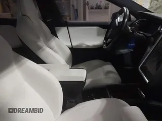 2017 Tesla Model S 100D with VIN 5YJSA1E23HF232059, listed as a IAAI auction lot 41394046 with 84,052 mi miles and . Bid and sale history available at DreamBid. Image 5.