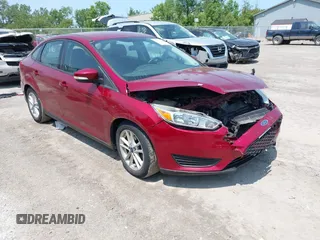 2016 Ford Focus SE z VIN 1FADP3F25GL305144, wystawiony jako IAAI lot #42388253 z przebiegiem 77 896 mil mil oraz . Historia ofert i sprzedaży dostępna na DreamBid. Obrazek 1.