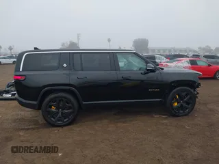 2024 Rivian R1S Adventure with VIN 7PDSGABA1RN035557, listed as a IAAI auction lot 41170478 with 5,210 mi miles. Bid and sale history available at carsss.com. Image 14.