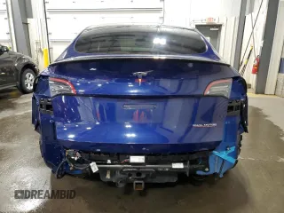 2020 Tesla Model Y Long Range with VIN 5YJYGDEF1LF035901, listed as a Copart auction lot 51004695 with 134,610 mi miles and Salvage Title. Bid and sale history available at DreamBid. Image 6.
