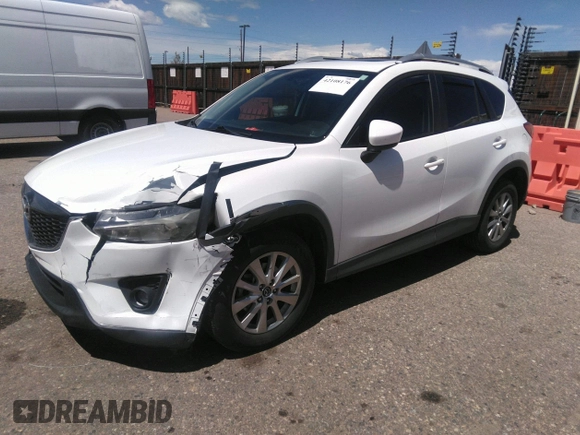2014 Mazda CX-5 Touring with VIN JM3KE2CY7E0364311, listed as a IAAI auction lot 42108176 with 90,506 mi miles and . Bid and sale history available at DreamBid. Image 14.