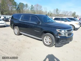 2015 Chevrolet Suburban LT with VIN 1GNSCJKC7FR536596, listed as a IAAI auction lot 41836470 with 587,623 mi miles. Bid and sale history available at carsss.com. Image 1.