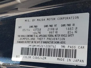 2014 Mazda Mazda3 s Grand Touring with VIN JM1BM1M32E1208762, listed as a IAAI auction lot 41814130 with 117,620 mi miles. Bid and sale history available at carsss.com. Image 9.