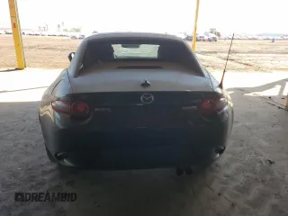 2023 Mazda MX-5 Miata Grand Touring z VIN JM1NDAM71P0551782, wystawiony jako Copart lot #88795725 z przebiegiem 22 626 mil mil oraz Nie do naprawy • Non repairable. Historia ofert i sprzedaży dostępna na DreamBid. Obrazek 6.