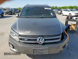 2014 Volkswagen Tiguan SEL z VIN WVGAV3AX6EW030705, wystawiony jako Copart lot #52156805 z przebiegiem 142 377 mil mil oraz Szkoda całkowita • Salvage title. Historia ofert i sprzedaży dostępna na DreamBid. Obrazek 5.